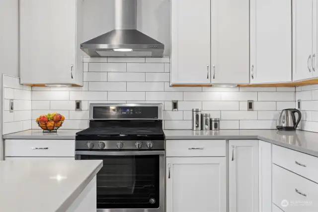 The gas range has 5 burners and just like new. There is plenty of light, including under cabinet lighting, as well.