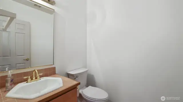 Nice half bath powder room for guests.