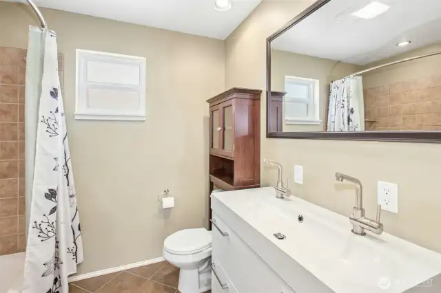Bath includes dual vanity.