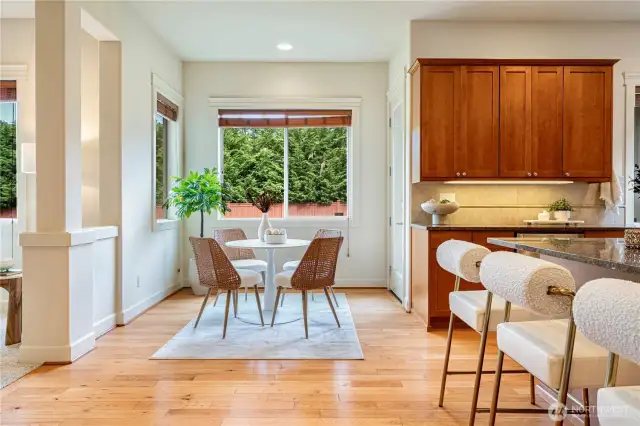 Bright breakfast nook with a window that lets you enjoy the view of the yard.