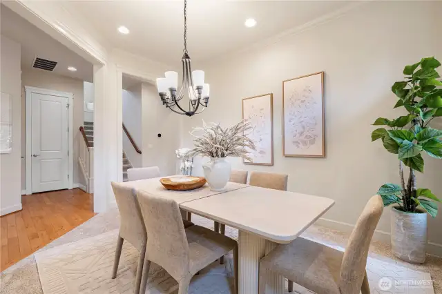 Elegant formal dining room featuring windows