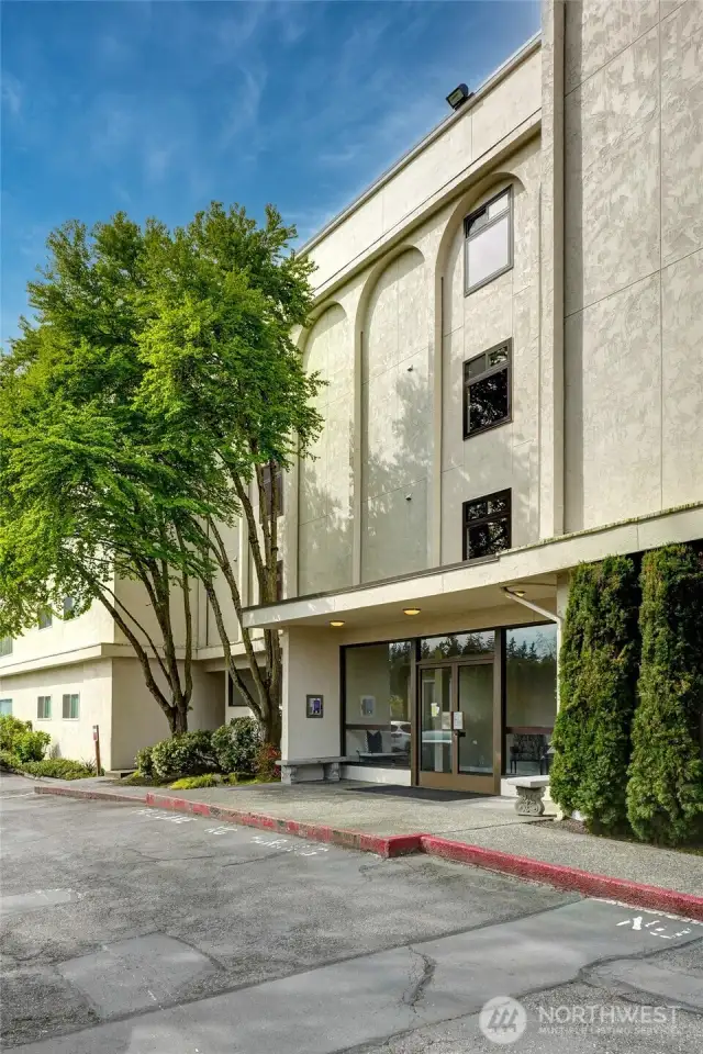 The building entrance is located on the east side, accessible directly from Main Street.