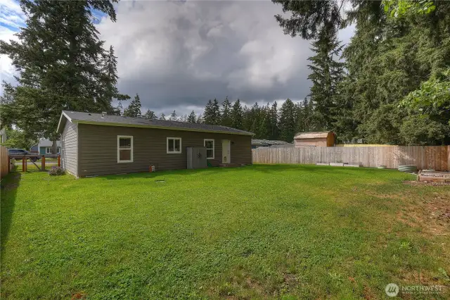 The fenced back is a nice blank canvas to create your own private oasis!