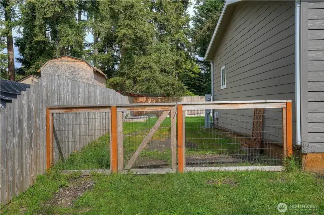 View of left side of home with access to the backyard.