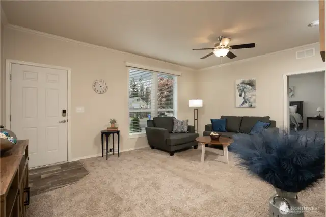 You will find nice details in this sweet home to include blinds throughout, crown molding in both the living room & kitchen.