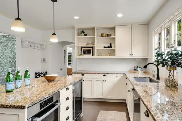 Expansive eat-in kitchen equipped with new appliances.