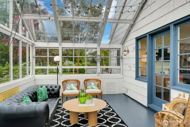 Incredible conservatory is a lovely addition to this gorgeous home. Pre-plumbed gas line for a gas fireplace. Ceiling canters open and is an operable greenhouse.
