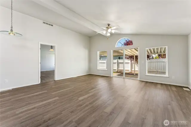 Living room w/ new flooring throughout