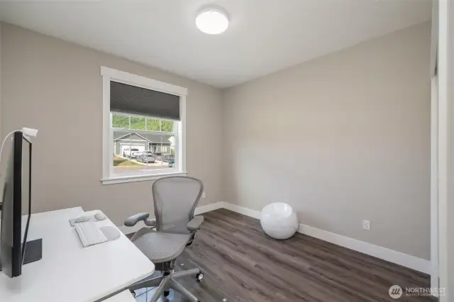 Second bedroom being used as an office.