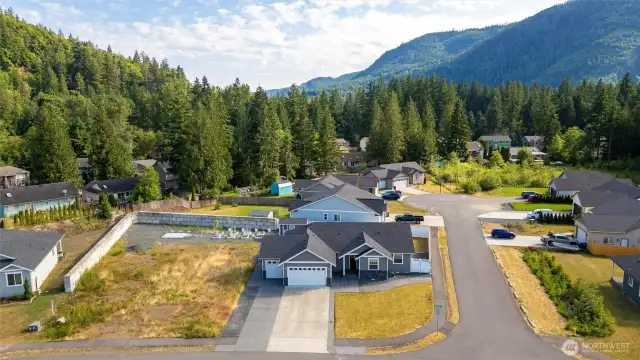 Shot of the house and the neighborhood.