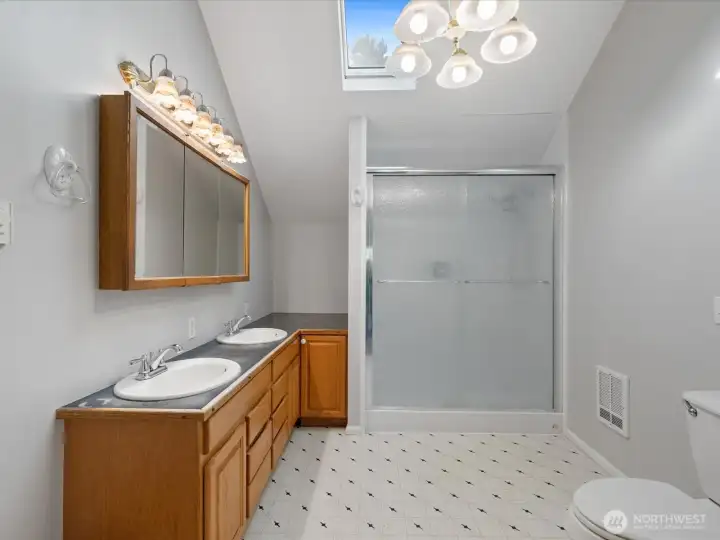 Enjoy the oversized primary bathroom.
