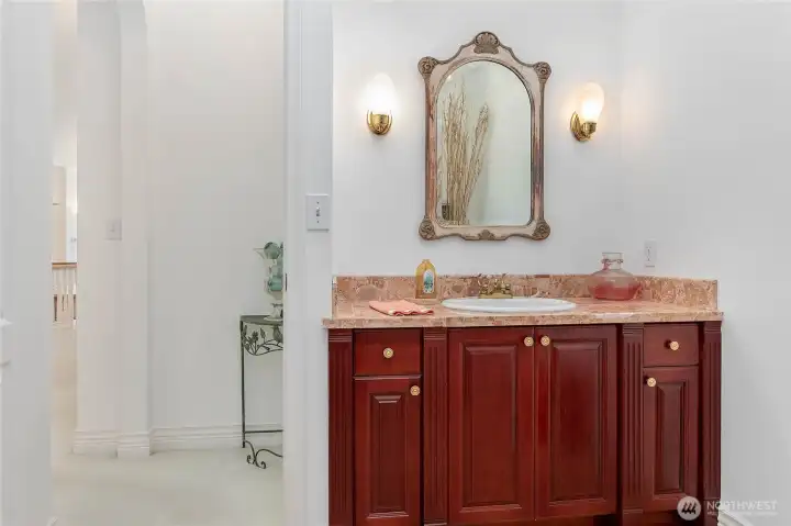 Solid cherry cabinetry and terrazzo tile!