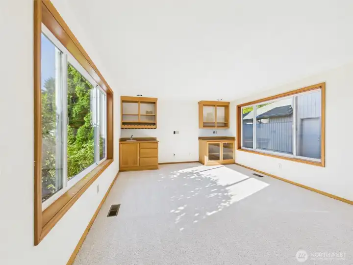 Den with wet bar.