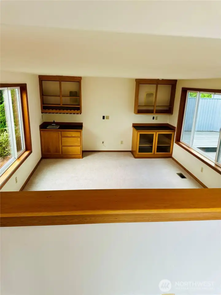 Pass through from breakfast nook to den.