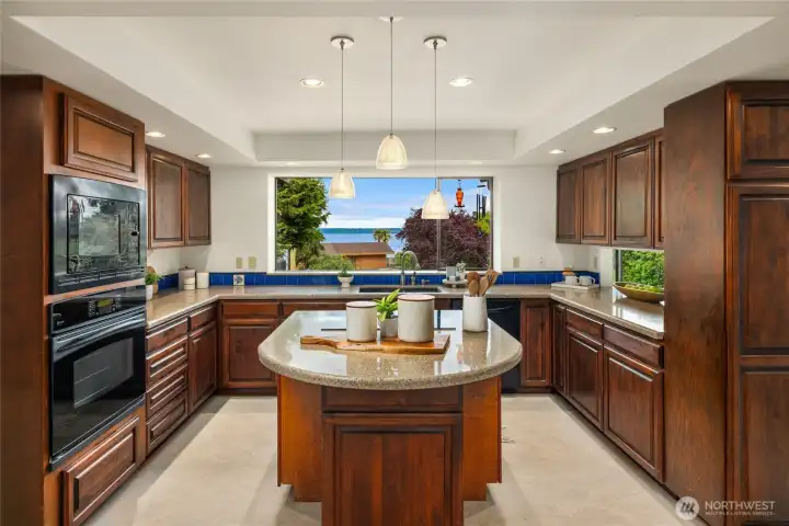The kitchen has a wonderful view of Puget Sound and the Cascades. Watch the marine traffic motor by while making your morning coffee.