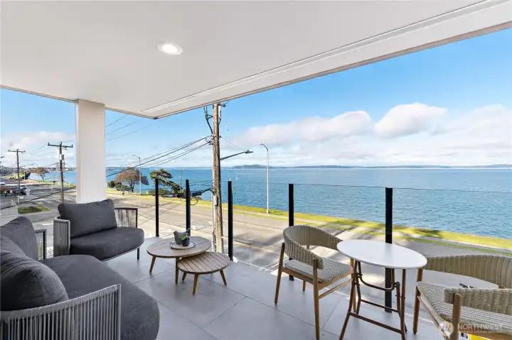 The covered deck was recently completely overhauled with new decking, new infinity glass railing and new siding.