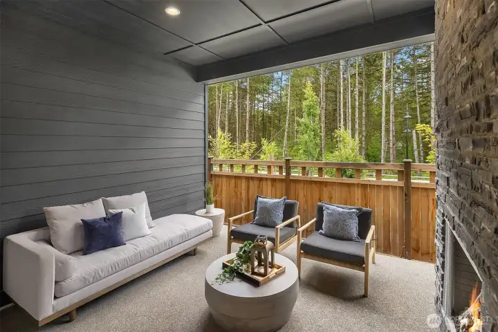 Private covered patio space looking out to private greenbelt