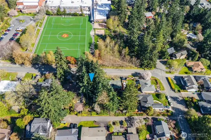 Located across the street from Lakeside Middle School the lot has front access on NE 135th St. as well as access from the back alleyway.