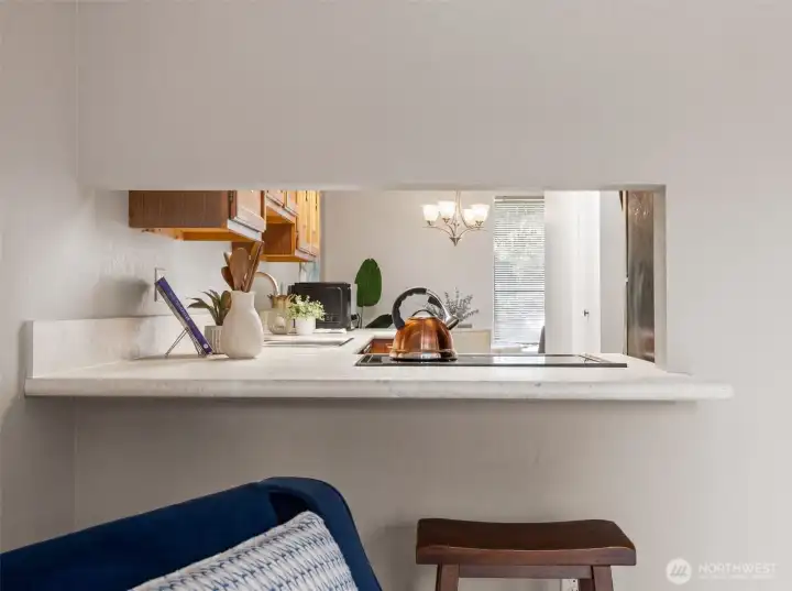 It’s the best of both worlds... a perfect pass-through and breakfast bar all in one. It keeps the kitchen connected while adding an easy spot for coffee, conversation, or a quick meal.