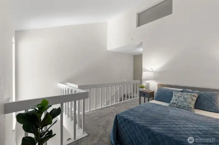 The vaulted ceilings make such a difference up here, and the open layout only adds to that feeling. The whole space feels airy, uplifting, and inviting.