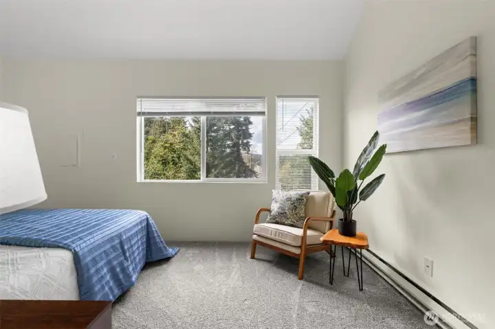 There is such a lovely sense of light in this space, and it makes the whole room feel even more inviting. Add in that Olympic Mountain view on a clear day, and it is something really special.