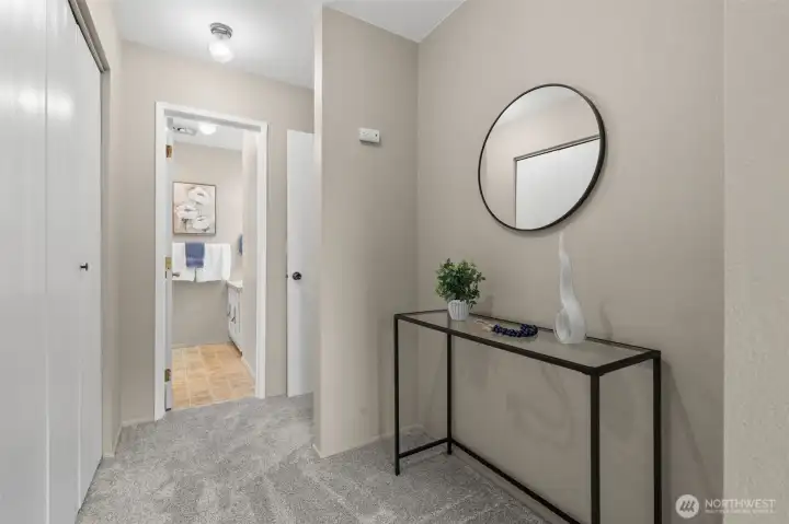 Just across from the closet, this alcove offers extra room to work with. It could be a great spot for tall shelving, a storage piece, or more closet space if needed.