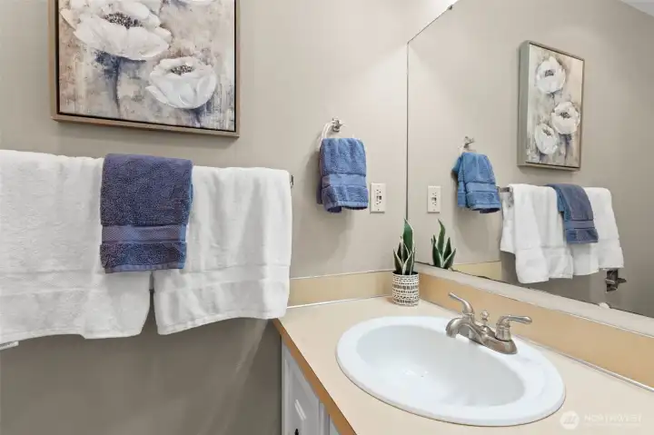 This primary bath, just like the rest of your new home, is comfortable and move-in ready now, with potential to personalize and add your own style over time.