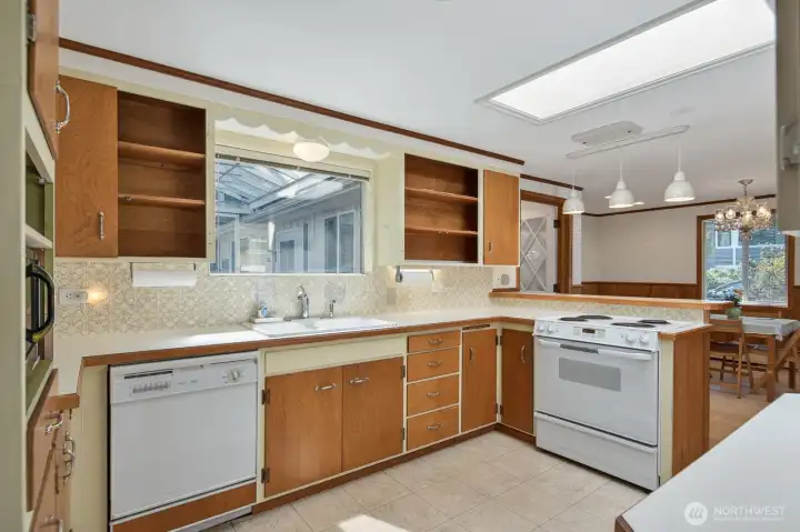 Nice sized kitchen with tons of potential. Skylight for natural light.