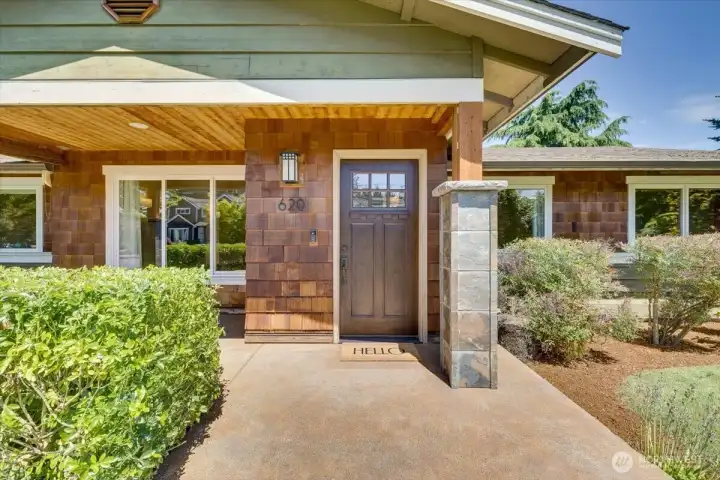 Covered front entry with inviting charm