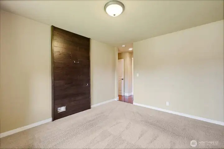 Primary Suite looking towards closet, bathroom, & entrance,
