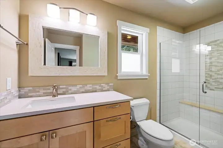Primary bathroom three quarter bath.