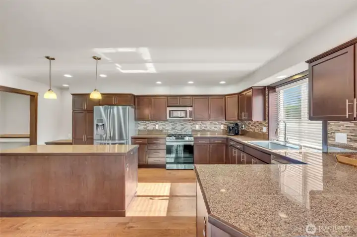 Granite counter and full backsplash.