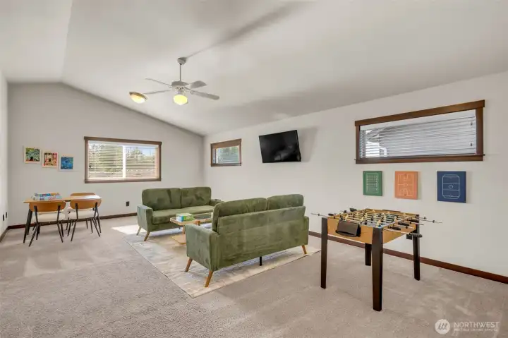 Bonus room is large with multiple windows.