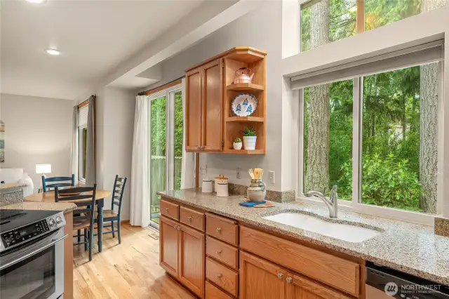 The sliding glass door opens to a private deck in a sylvan setting! Enjoy the afternoon sun and western exposure!