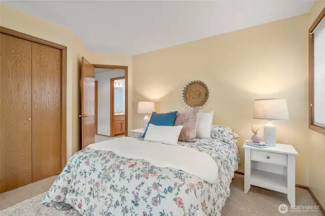 Second bedroom upstairs is a cheerful, quiet space.