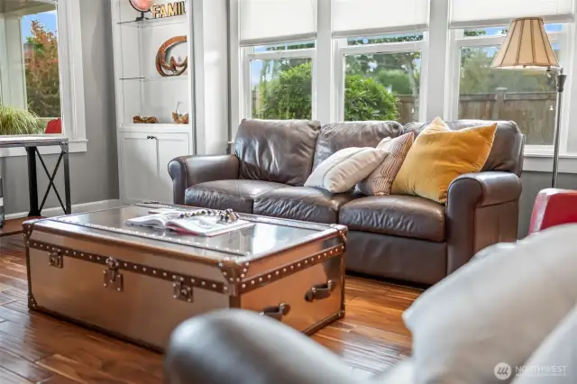 Abundant natural light with a southern facing home. The living room space isn't huge but it sure is comfy and elevated.
