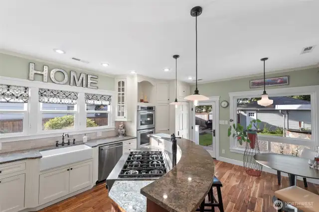 Step into the custom designed kitchen and you will find a plethora of all you could ever need to make a meal of a lifetime or host an event that flows from room to room.