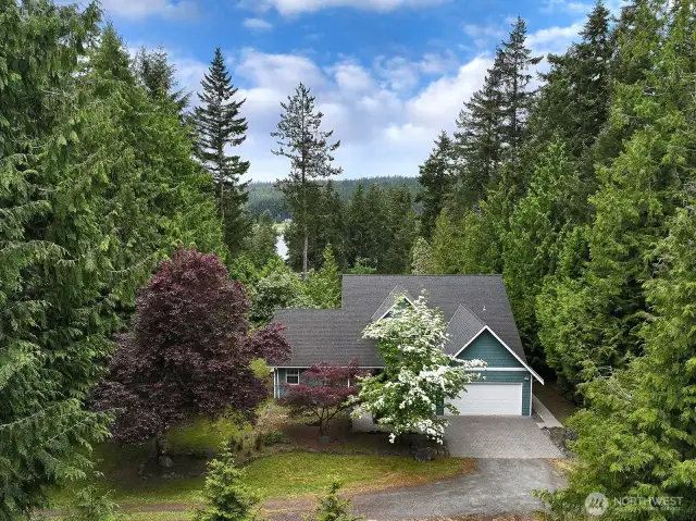 Welcome to 5257 April Drive where you are part of a neighborhood with lake access, yet you have your own private acreage. Enjoy your gorgeous dogwood tree currently in bloom. **Open House Saturday/24th from 12-2pm**
