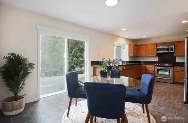Granite countertops and an abundance of cabinetry. Stainless appliances.