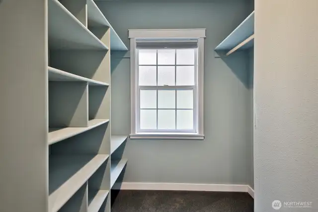 Custom shelving and space to organize your wardrobe.
