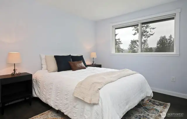 Bedroom #2 is located along the western side of your home and also has peek-a-boo views of the lake. It, too, has a standard sized closet.