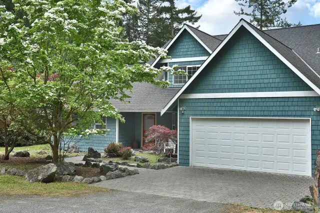 Two car garage. There is an entry from the garage directly into a hallway with a half bath to your left and a spacious laundry room to the right and the kitchen straight ahead. You will love the easy access from the garage into your home.