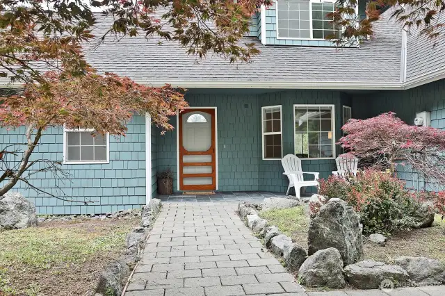 Ready to go inside?  Open up that wonderful screen door, and let's go in. Bay windows to the right are the formal living room and/or dining room.