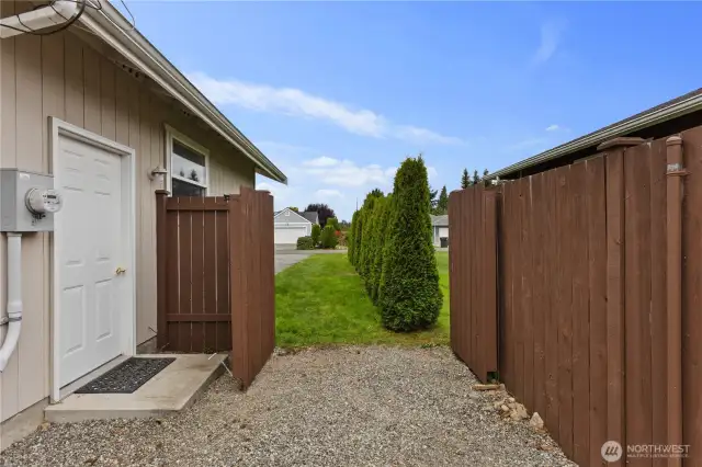 Side yard looking to the front of home