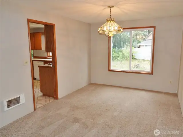 Dining Room, which leads into the Kitchen.