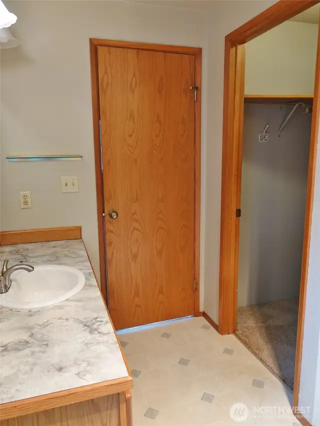 Master Bathroom w/ a walk-in closet.