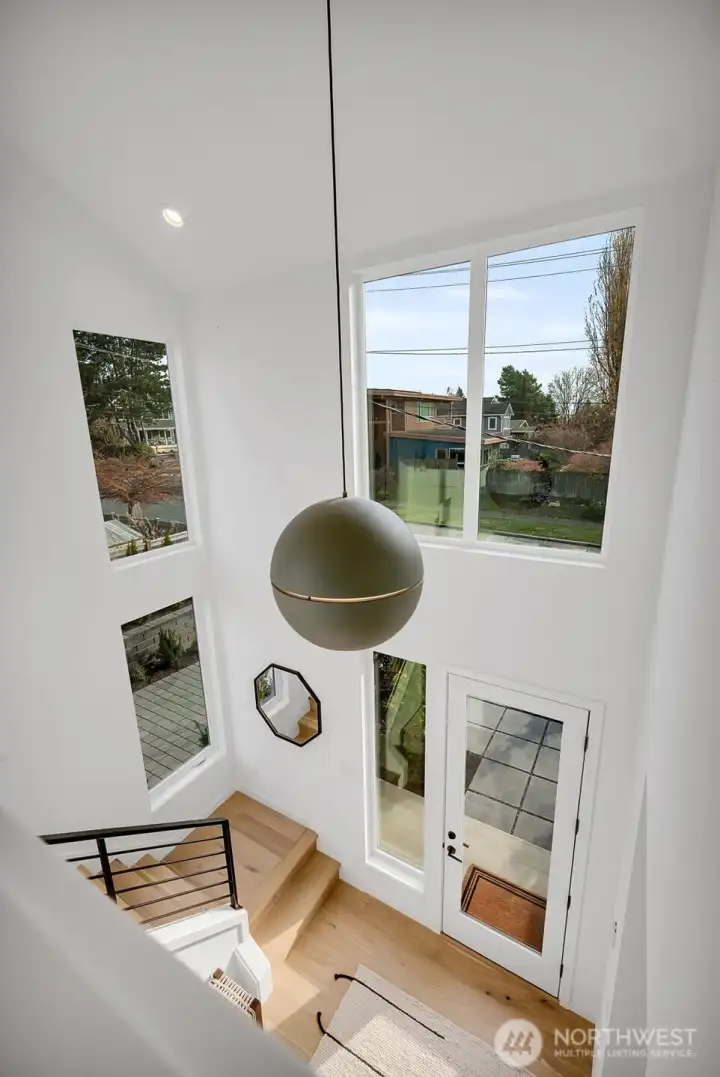 Staircase to 4 upper bedrooms.