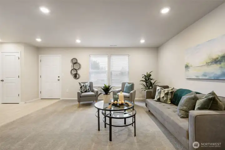 Great room area, open to kitchen and dining.