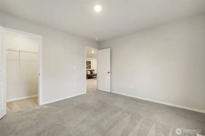 Third of Four large Bedrooms.