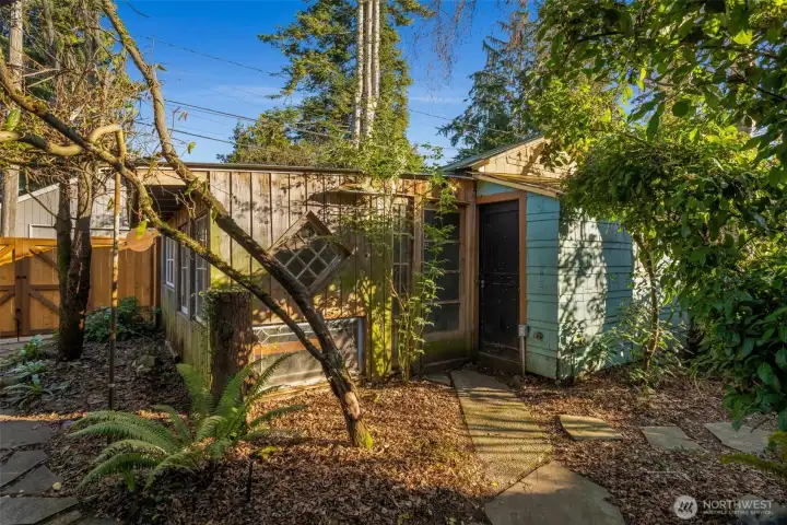 Studio to the left, garage on the right.